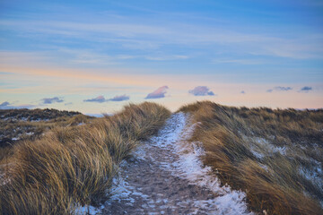 long Pathway to the beach during evening in winter. High quality photo - 729654392