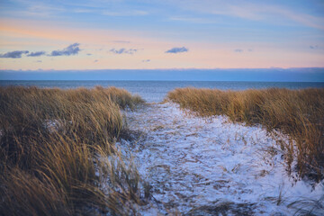 Snow at danish coast during evening in winter. High quality photo - 729654740