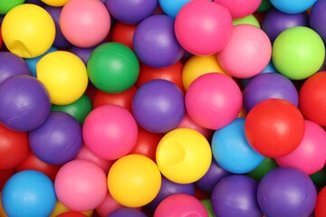 Many colorful balls as background, top view