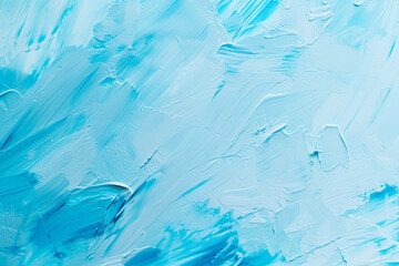 Textured shades of blue paint strokes on a canvas, mixing light and dark tones with a palette knife effect.