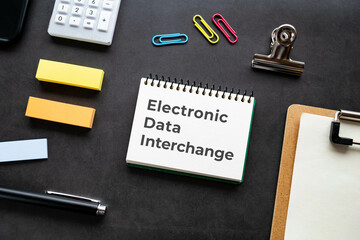 There is notebook with the word Electronic Data Interchange. It is as an eye-catching image.