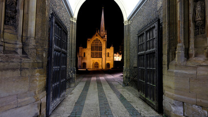 Night time view of Norwich Cathedral, Norfolk, UK