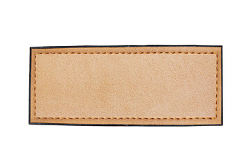 Brown leather belt strap closeup isolated on white. Brown stitched leather seam frame label tag isolated on white. Empty copy space fashion background. Seam stitch pattern.