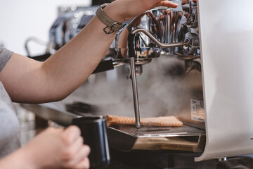 person working on sewing machine