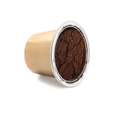 One open plastic coffee capsule isolated on white