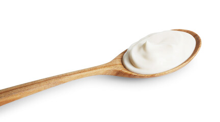 One wooden spoon with mayonnaise isolated on white