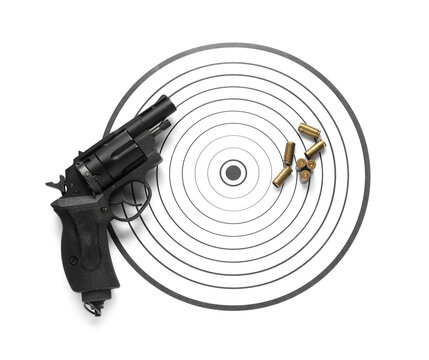 Shooting target, handgun and bullets isolated on white, top view