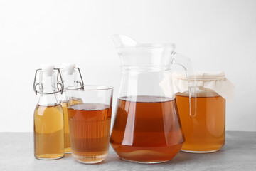Homemade fermented kombucha on light grey table