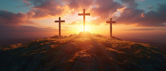 Christian Easter concept. Resurrection of Jesus Christ. Silhouette of three crosses on mountain summit.