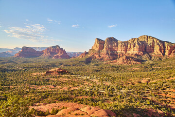 Sedona Red Rock Formations and Verdant Valley at Sunset