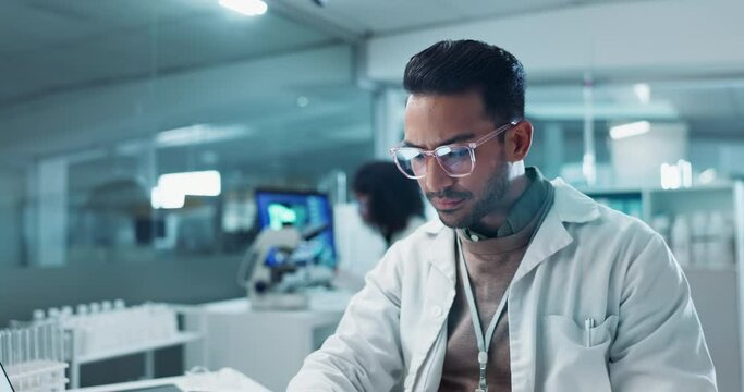 Science, beaker and chemical with laptop in laboratory for chemistry experiment, test sample and medical research. Scientist, man and liquid inspection for clinical analysis, investigation and study