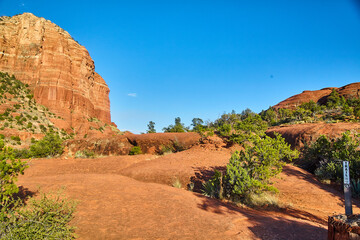 Sedona Red Rock Cliffs and Hiking Trail Under Blue Sky