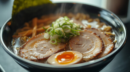 Miso ramen from Japan featuring tender pork slices, a soft-boiled egg, and fresh spring onions