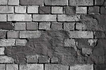 old brick wall close up in gray color