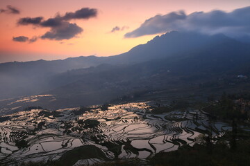 Yuanyang Rice Terraces or known as Yuanyang Terraced Field,known as a land sculpture, the terraced fields have been officially acknowledged by UNESCO as a World Cultural and Natural HeritageSite
China