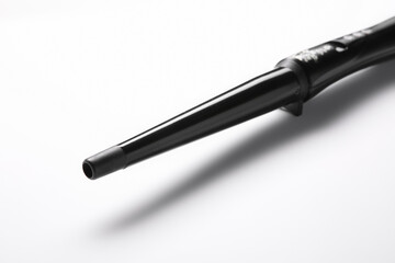 Modern clipless curling hair iron on white background