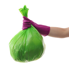 Woman holding plastic bag full of garbage on white background, closeup