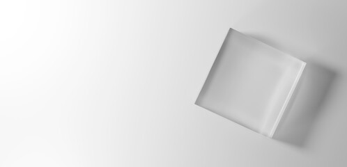 白背景に透明な立方体のガラスの台座。コピースペース。俯瞰。3D（横長） - obrazy, fototapety, plakaty