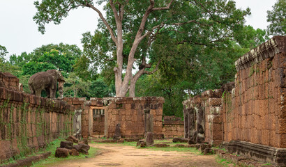 Stone red and brick temple ruin building complex structure Pre Rup Angkor Wat historical site in...