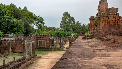 Red stone temple ruin complex structure of Pre Rup Angkor Wat historical park in the green forest of Siem Reap Cambodia