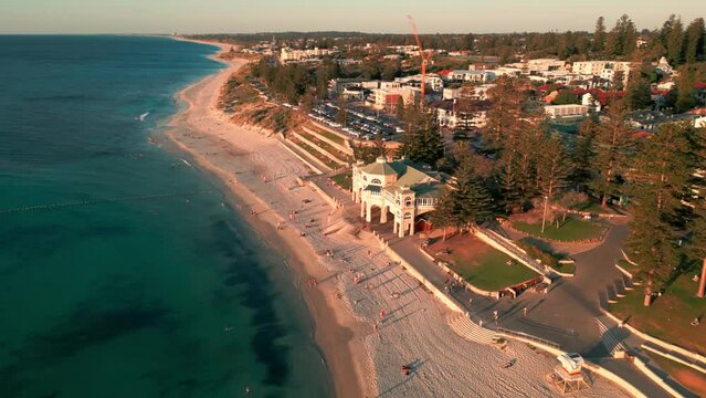 Approaching Aerial over Cottesloe Beach and Indiana Teahouse at Sunset, Perth, Australia