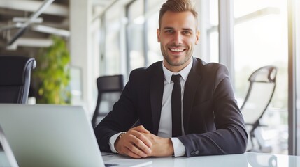 Businessman sitting in front of laptop