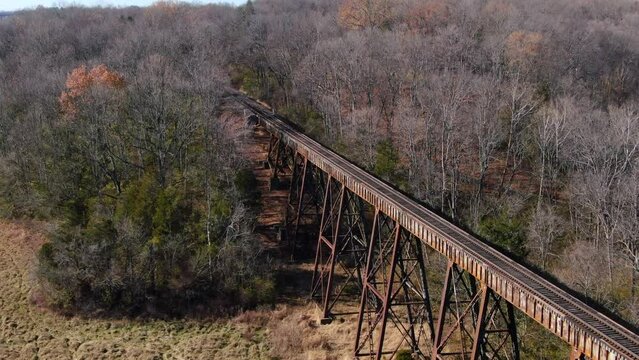 Tight Aerial Shot Of Train Tracks Running off the Pope Lick Trestle and into the Woods in Louisville Kentucky.