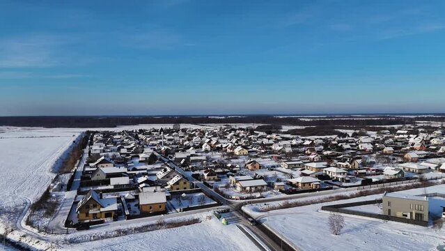 Cinematic drone shot of city of Silute living society landscape in winter, Lithuania