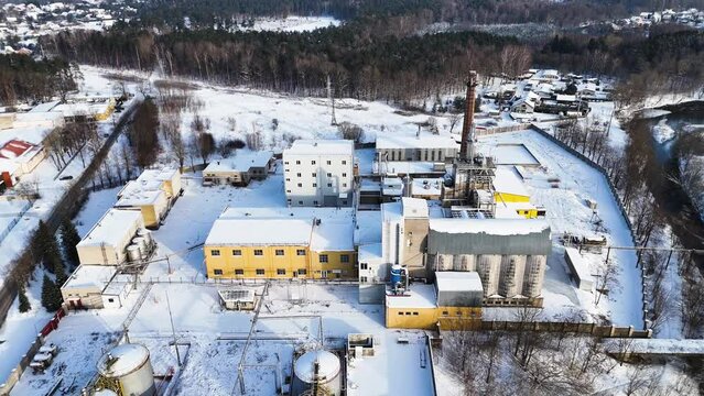 Drone view industrial building of electric utility company in city of Silute in winters, Lithuania