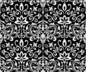 Wallpaper in the style of Baroque. Seamless vector background. White and black floral ornament. Graphic pattern for fabric, wallpaper, packaging. Ornate Damask flower ornament