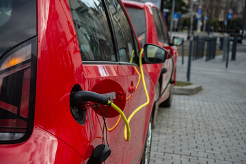 charging an electric car on the street