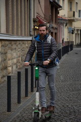 man riding electric roller in the city © VSzili