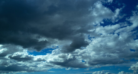 Dramatic Colorful Sunset Sky. Clouds with Sunrays. Cloudscape Nature Background. Panorama sunset sky and cloud background. Dark Clouds, Night Sky. Dark Dramatic Sky, Epic Sunset Clouds.
