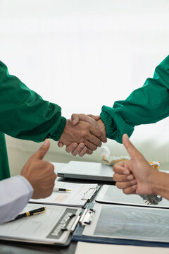 Medical team or doctor holding hands in interview Good job or successful promotion at the meeting Congratulations hospital or medical personnel, close-up image