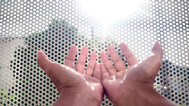 hands of a Muslim who is praying