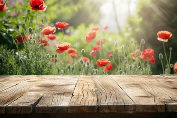 Fotobehang an empty boardwalk on the background of a blooming field with poppies. display your product outdoors. © MaskaRad