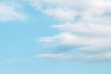 Background of blue sky with white clouds