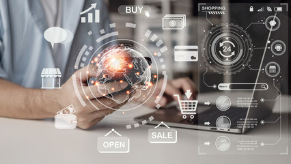 Internet store buy online e-commerce concept Person's hand using smartphone with shopping chart on laptop screen and shopping cart business icons, internet concept of e-commerce technology