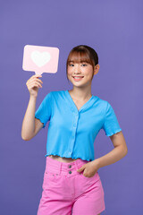 Photo of funny young asian lady show like wear blue crop-top isolated on purple background
