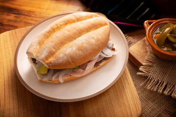 Mexican ham sandwich, in Mexico it is called Torta de Jamon, it is the most popular of the Mexican Tortas and the recipe varies depending on who prepares it, made with bolillo o telera bread.