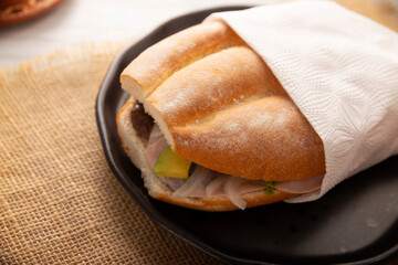 Mexican ham sandwich, in Mexico it is called Torta de Jamon, it is the most popular of the Mexican Tortas and the recipe varies depending on who prepares it, made with bolillo o telera bread.