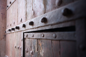 Ancient wooden gate,close up ,in Amber Fort,Jaipur ,India