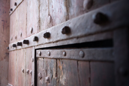 Ancient wooden gate,close up ,in Amber Fort,Jaipur ,India