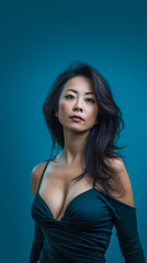 Naklejka premium Asian middle aged woman portrait with copy space background