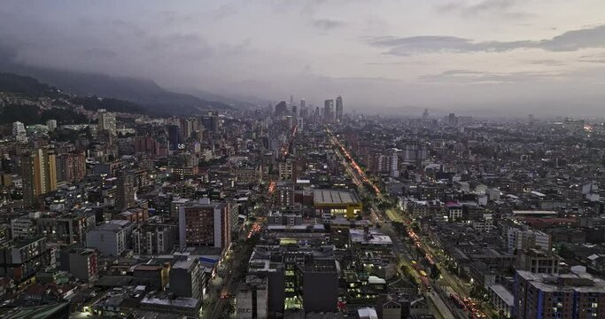 Bogota Colombia Aerial v20 drone flyover Marly neighborhood towards Chapinero and Teusaquillo along Avenida Caracas capturing downtown cityscape on the skyline - Shot with Mavic 3 Cine - November 2022