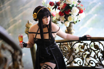 Portrait of a beautiful young woman Cosplay with Spy dress