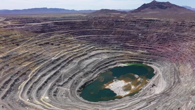Aerial view of an exhausted open pit copper mine near Ajo, Arizona, USA.