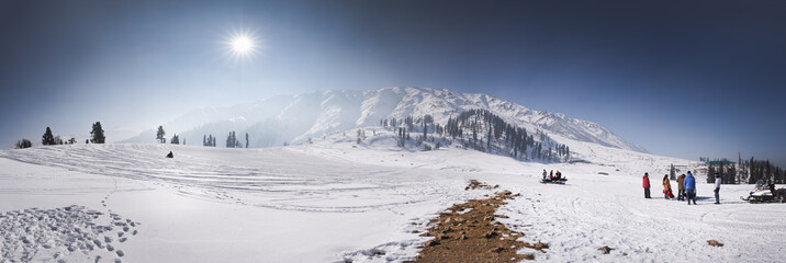 Gulmarg, Kashmir Gulmarg lies in a cup-shaped valley in the Pir Panjal Range of the Himalayas, at an altitude of , 2,650 m (8,694 ft), 56 km from Srinagar