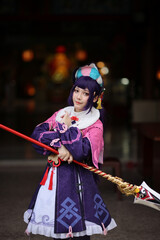 Naklejka premium Portrait of a beautiful young woman game Cosplay with Chinese dress