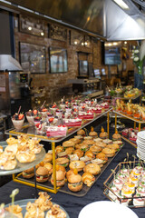 Catering banquet table with delicious food and snacks for party or corporate event